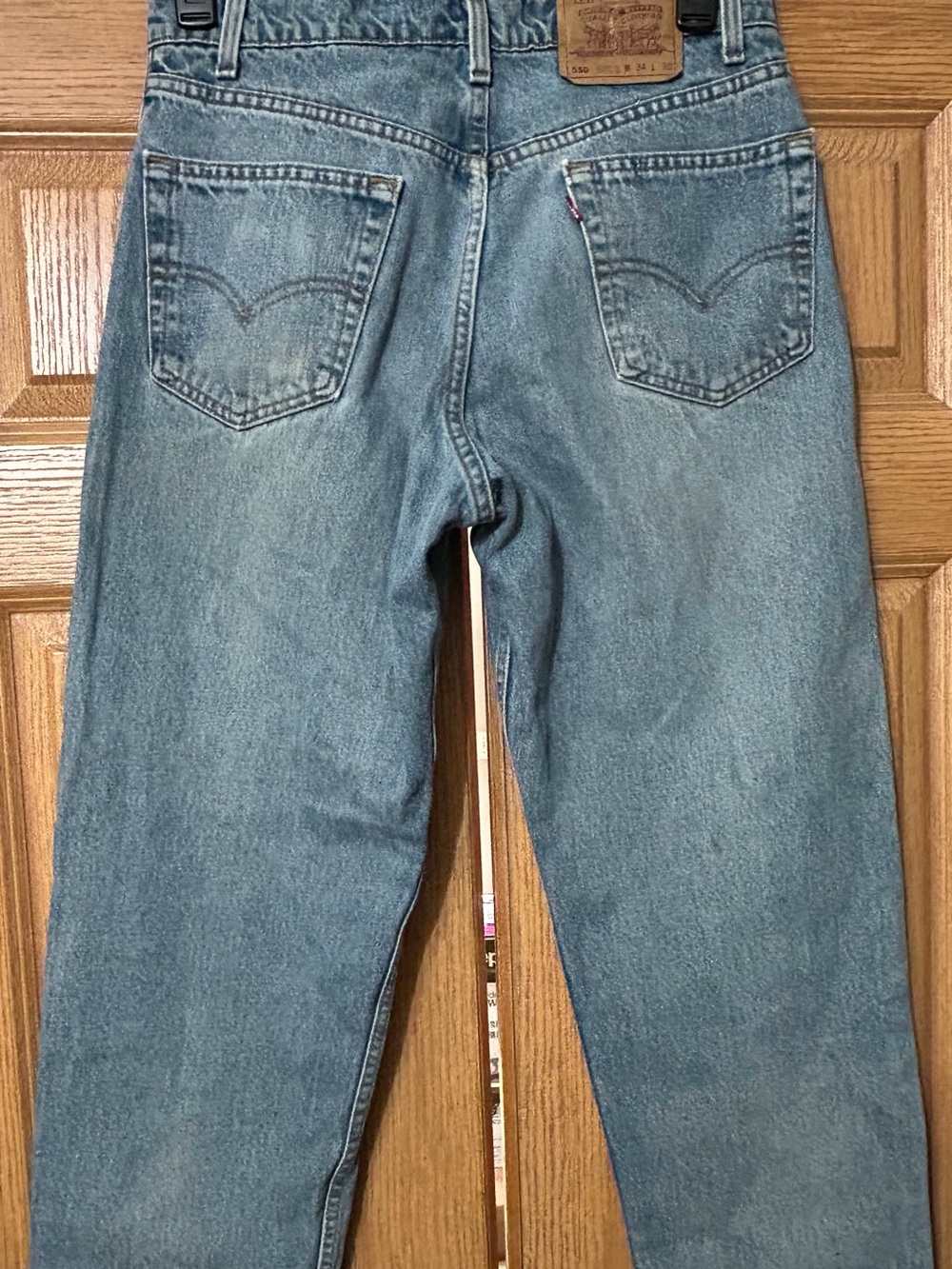 VTG Levis 550 Jeans Mens 34x30 Blue Relaxed Tapered Light Wash Made In USA 90s
